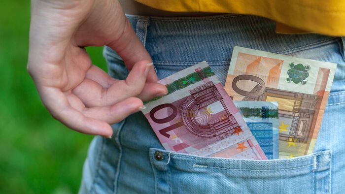 Euro notes in pocket